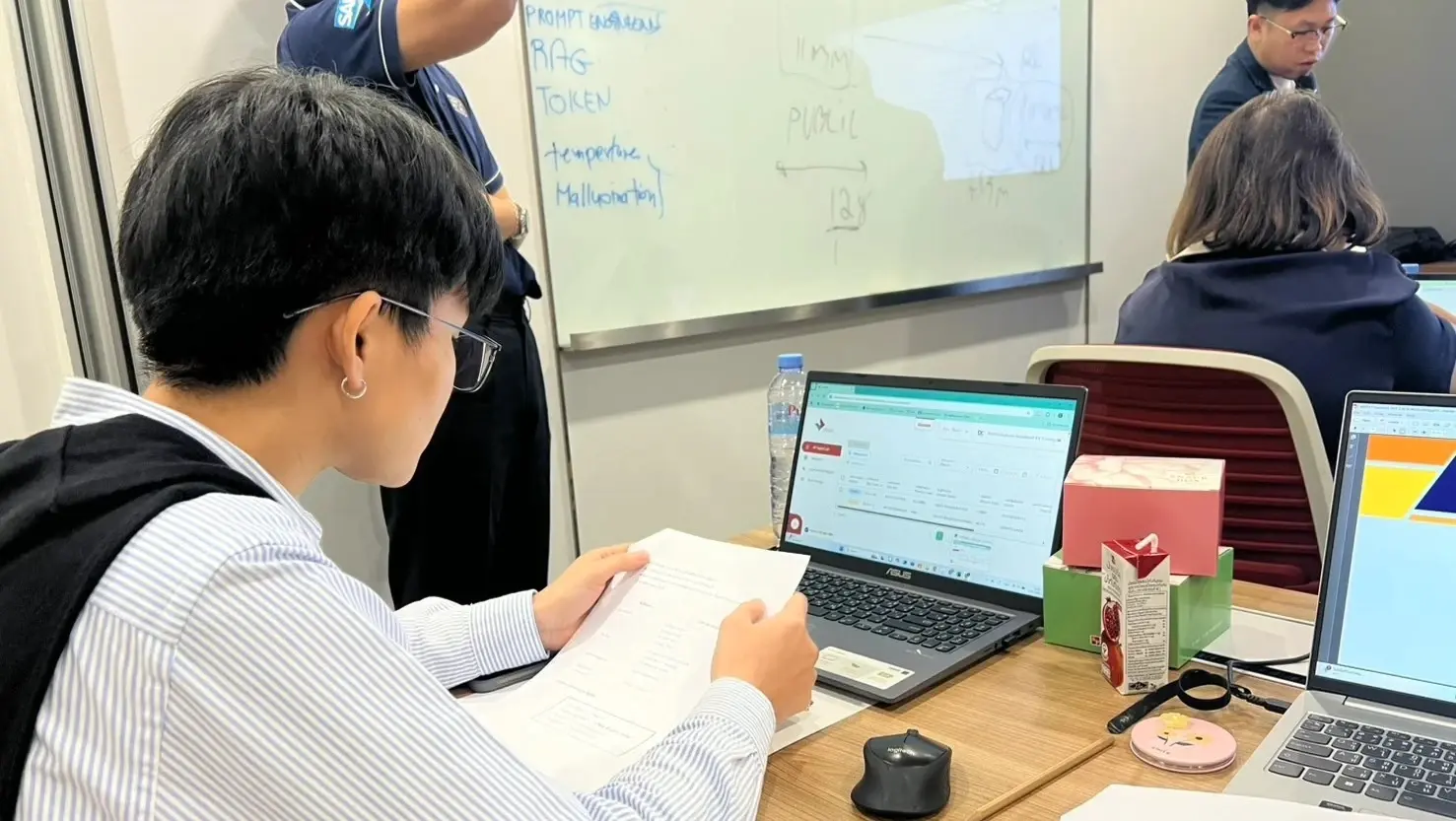 Tax professional reviewing documents and preparing information for tax filing