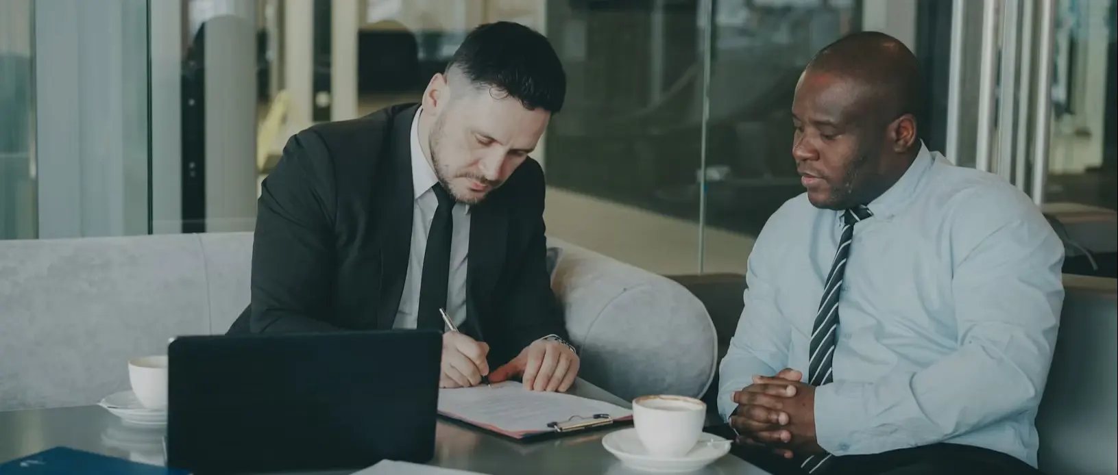 Business adviser assisting entrepreneurs with company and partnership registration