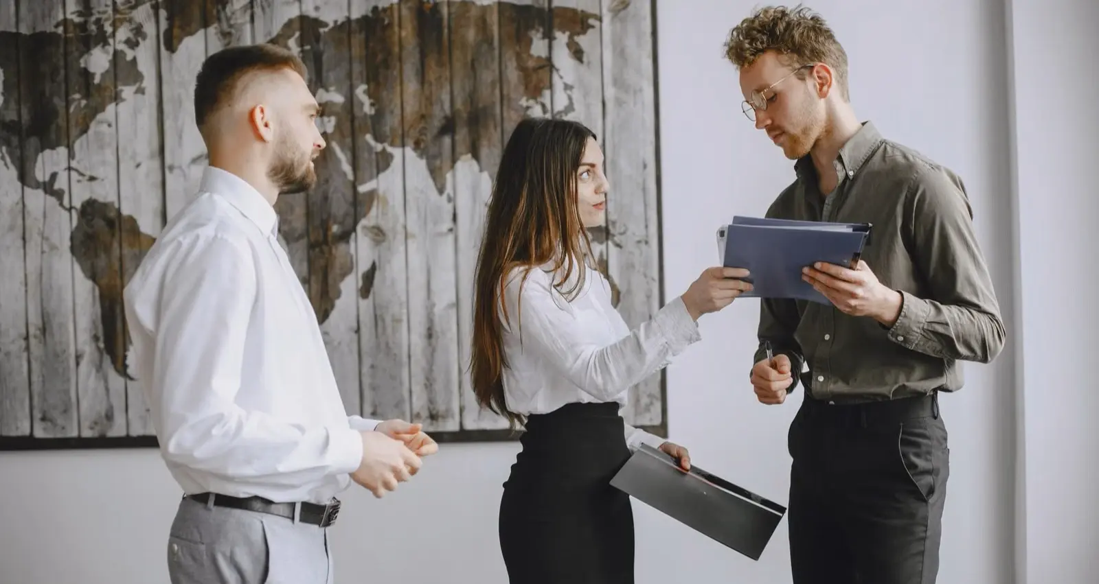 Professional team advising a client about amendments to business registration records