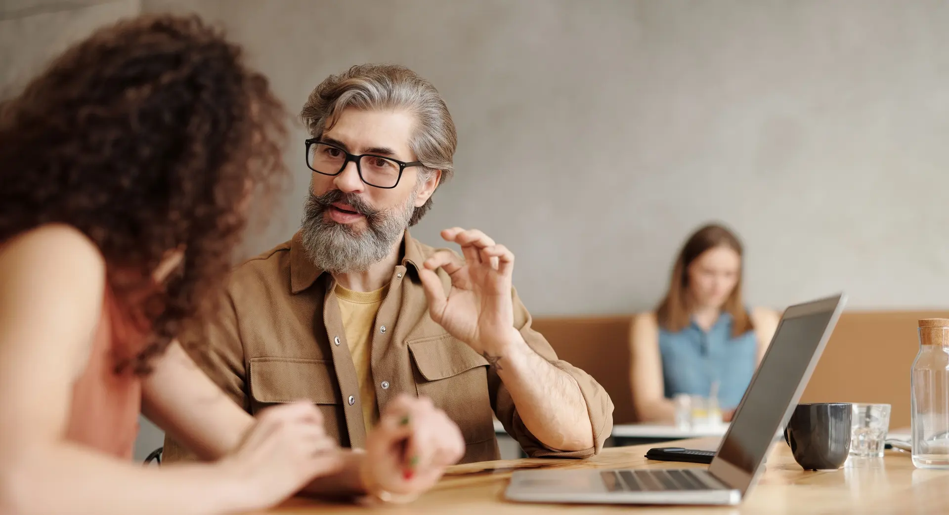 Business owner consulting a specialist about employer and social security registration