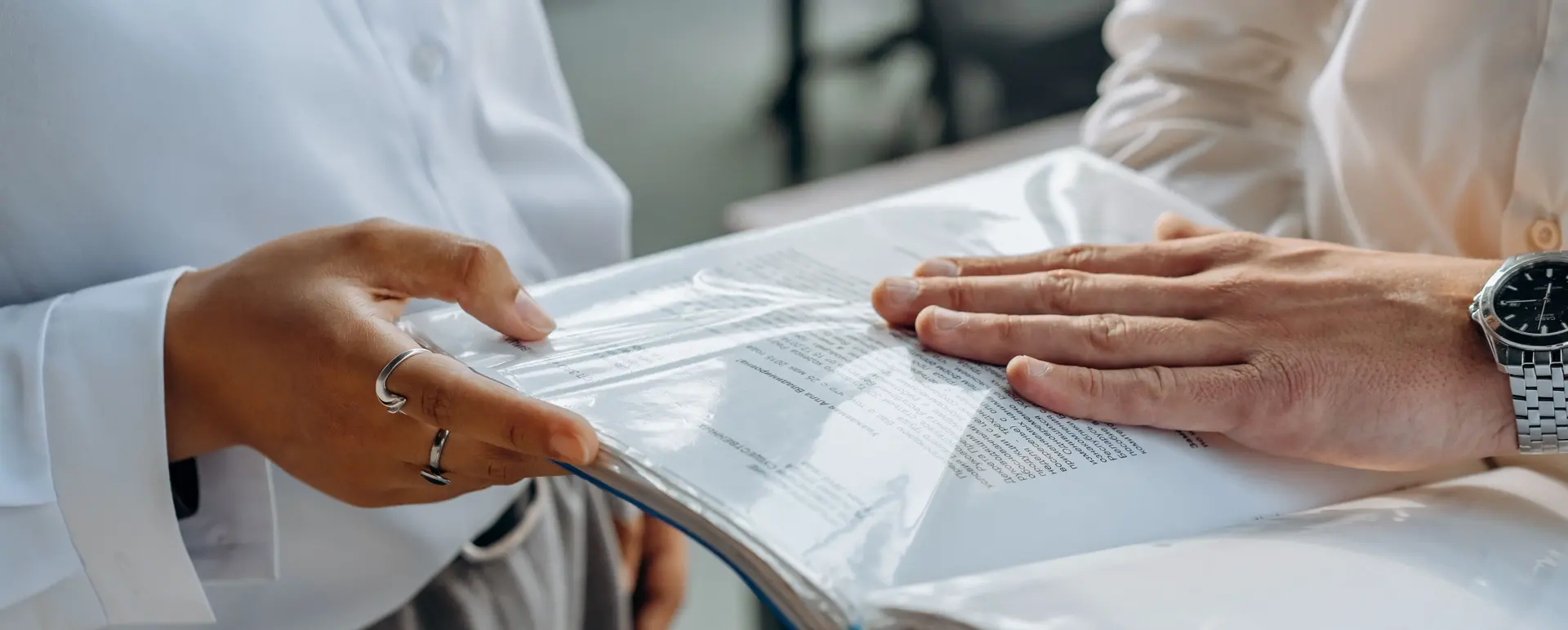 Business team reviewing documents before company dissolution and liquidation